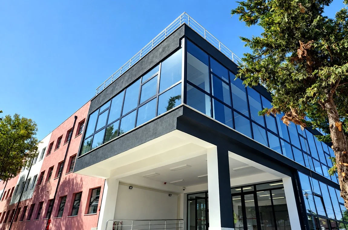 Glass facade and entrance of Mehmet Babamusta School